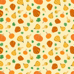 Autumn seamless pattern with pumpkins and leaves. Vector illustration