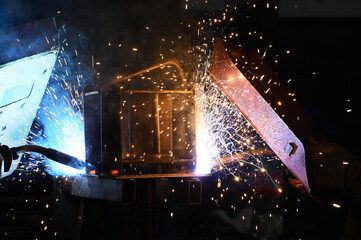 two welders welding at the same time