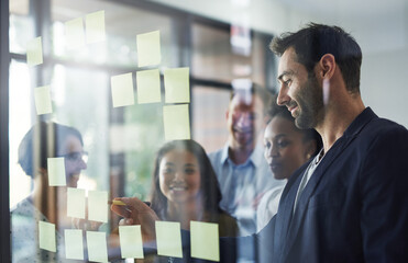 Idea, glass and business people in meeting for brainstorming, discussion and planning in office....