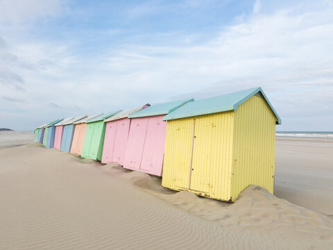 Colorful tilted beach cabins at Berck-Plage, France