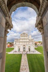 The facade of the Pisa Cathedral and the leaning Tower (on the background) in Piazza dei Miracoli in Pisa, Tuscany, Italy. The view is from the Baptistery. 