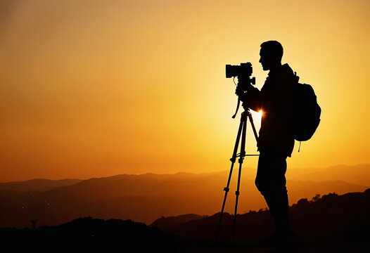 photographer at sunset - Powered by Adobe