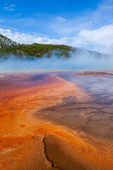 Steam rising from colorful grand prismatic spring in yellowstone national park