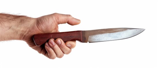 Hand Holds Knife Isolated On A White Background