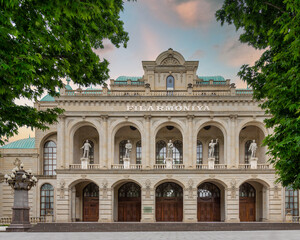 Ganja State Philharmonic Hall is in Ganja, Azerbaijan. The building has a classical facade with arches, columns, and statues. It is known for its beautiful architecture and cultural performances