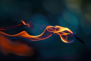 A vibrant swirl of fire dances in the dark, showcasing dynamic movement and rich colors for...