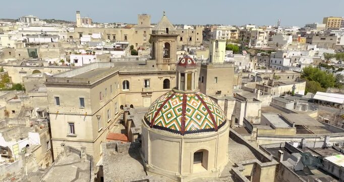 Aerial closeup of the dome of San Francesco da Geronimo sanctuary in the historic center of Grottaglie. It is a church of the city in the province of Taranto, in Puglia, Italy.