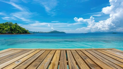 Wooden table on the background of the sea, island and the blue sky