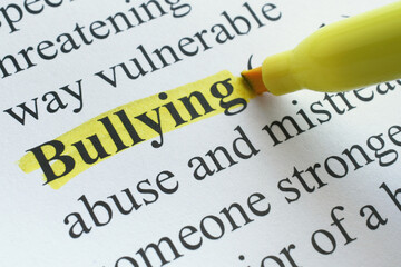 Fake dictionary entry with the word bullying being highlighted. Bully abuse harass torment 