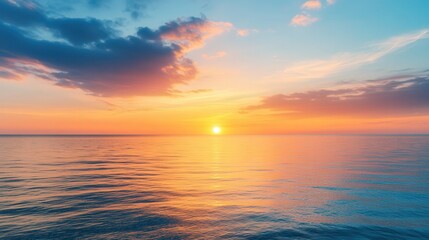 Fototapeta premium Vibrant Sunset Over Tranquil Ocean, an expansive view of a summer evening sky filled with warm hues, ideal for adding personal reflections or messages.