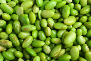Fresh edamame beans as background, top view