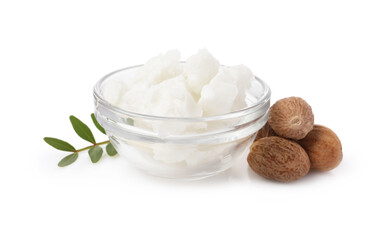 Shea butter in bowl and nuts isolated on white
