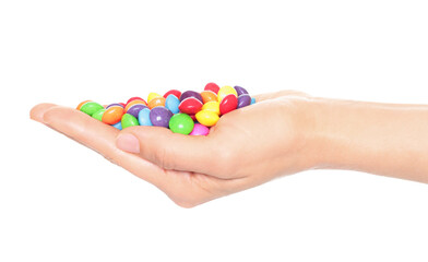 Woman hand holds lot of color candies, isolated on transparent background, fast food concept