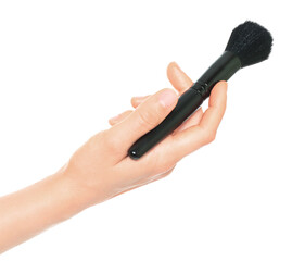 Woman hand holds black cosmetics brush, isolated on transparent background, cosmetics and visage concept