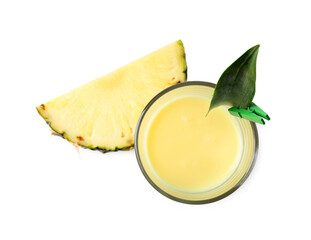 Tasty pineapple smoothie in glass and slice of fruit isolated on white, top view