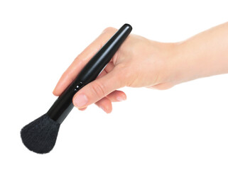 Woman hand holds black cosmetics brush, isolated on transparent background, cosmetics and visage concept