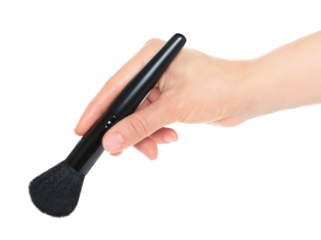 Woman hand holds black cosmetics brush, isolated on transparent background, cosmetics and visage concept