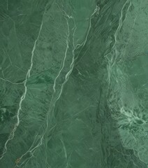 Obraz premium a close-up view green marble surface with a textured and patterned appearance, featuring a mix of white and green hues