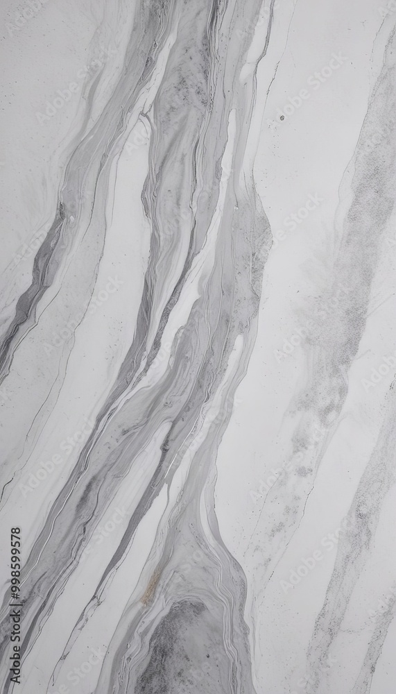 Fototapete a close-up view marble surface with a swirling pattern of gray and white marble, creating a sense of movement and depth