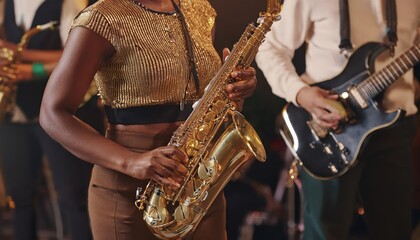 Obraz premium Unrecognizable Black jazz musician playing saxophone on stage at local bar with medium