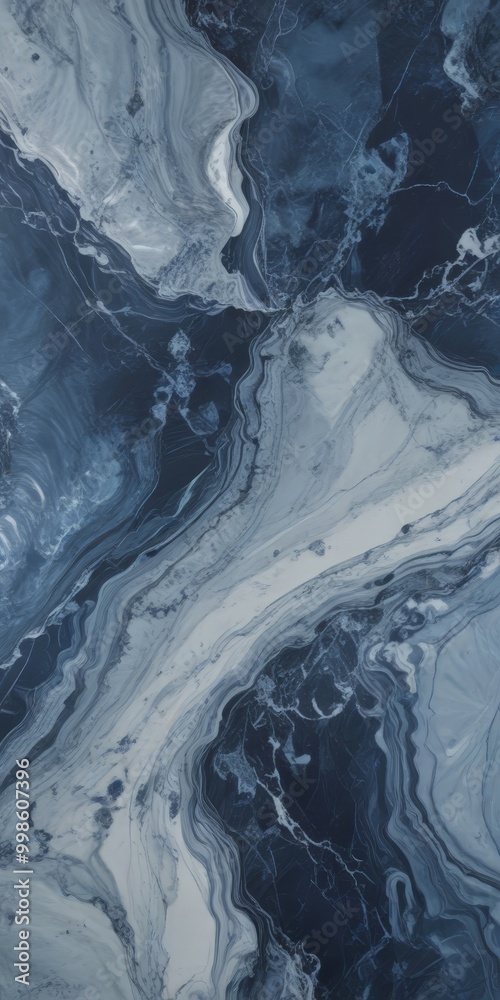 Aufkleber a close-up view marble surface with a swirling pattern of blue and white hues, creating a sense of movement and depth