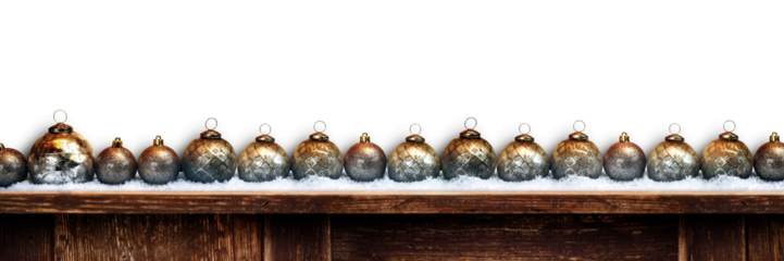 Row silver christmas balls outside in snow
