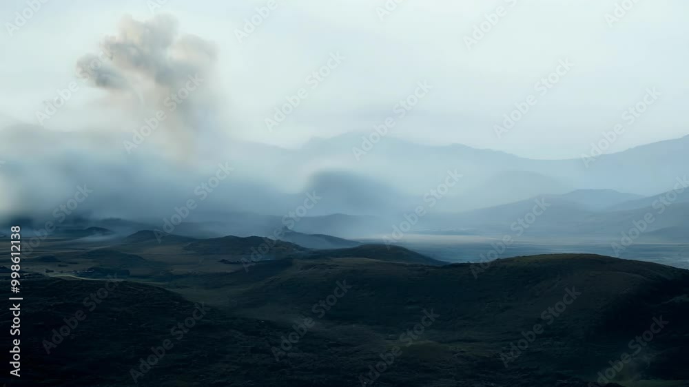 Poster Ash and smoke are rising from the caldera of an erupting volcano, creating a dramatic scene of natural power and the awesome forces of nature