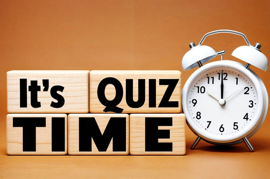 3d render of wooden block with word text "It's Quiz Time" and alarm clock