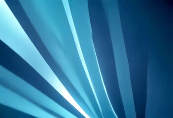 a close-up view curved, abstract pattern of blue and white lines, creating a sense of movement and dynamism