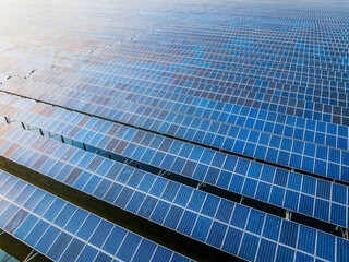 Obraz premium Aerial view of solar power station at seaside