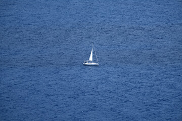 Sailboat sailing on the Mediterranean Sea. Ship sailing in full sails on the sea. Yacht in the sea