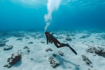 diver scuba diving under the ocean