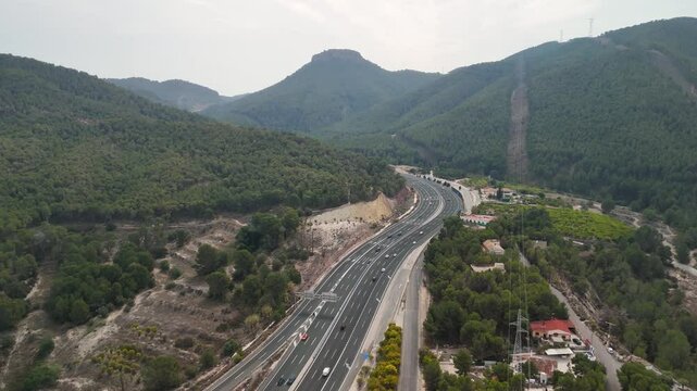 Little traffic on a mountain motorway seen from the air in southern Spain. Puerto de la Cadena in Murcia.