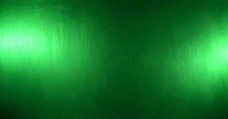 a close-up view green metal surface with a reflective, shiny texture The background is blurred, drawing focus to the metallic surface