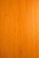 Naklejka premium a close-up view wooden surface, with a light brown color and visible wood grain patterns