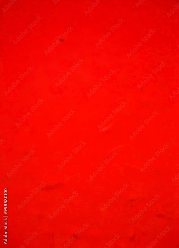 Poster a close-up view red surface with a slight texture, resembling a fabric or a canvas The color is vibrant and the background is blurred, drawing attention to the red surface