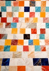 Fototapeta premium a close-up view mosaic floor composed of square tiles in various colors, arranged in a grid-like pattern