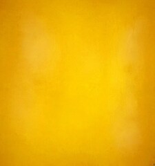Fototapeta premium a blurred yellow background with a subtle texture, creating a soft and warm visual effect