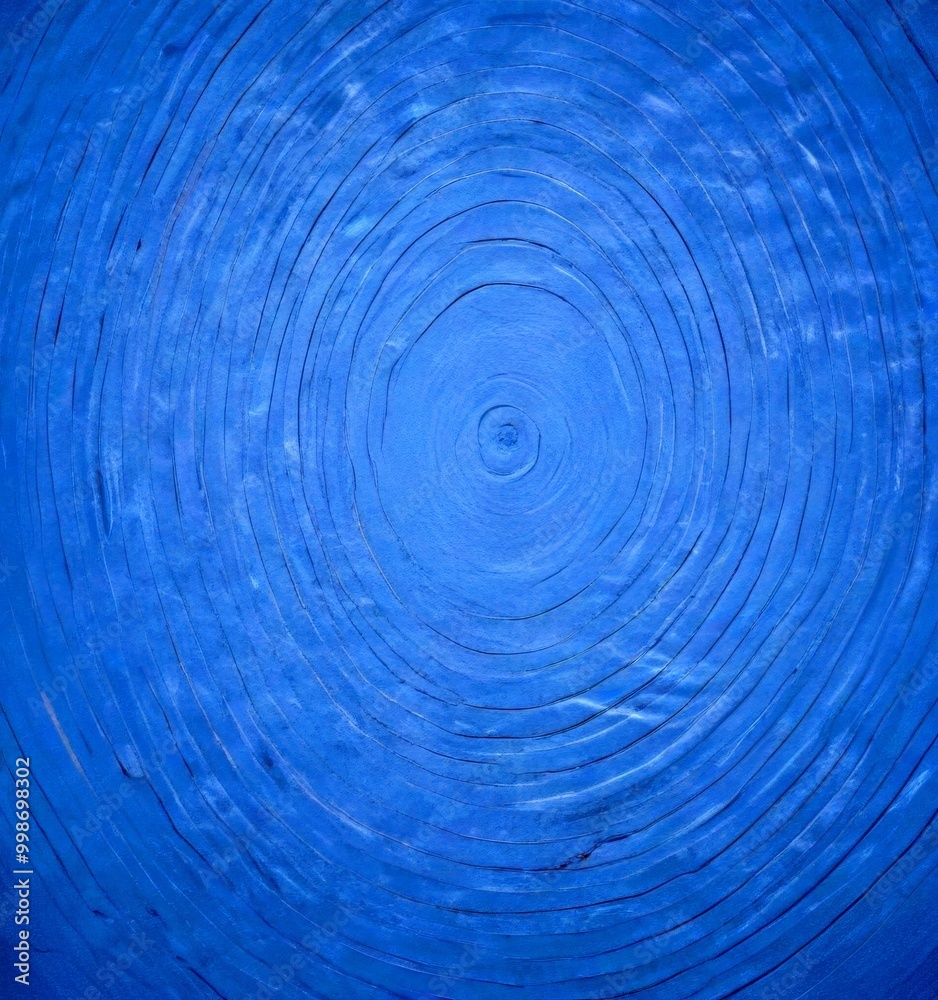 Aufkleber a close-up view blue surface with concentric circles of varying sizes, creating a visually striking pattern
