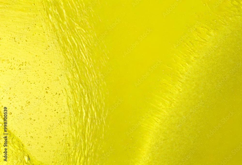 Poster a close-up view textured surface with a vibrant yellow hue, featuring a subtle pattern of lines and droplets