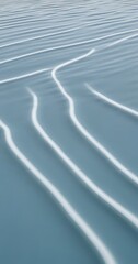 Obraz premium a close-up view of rippling water, with a series of concentric white lines that create a sense of movement and depth