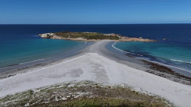 Descending towards Diamond Island with sandbar towards beach, aerial shot