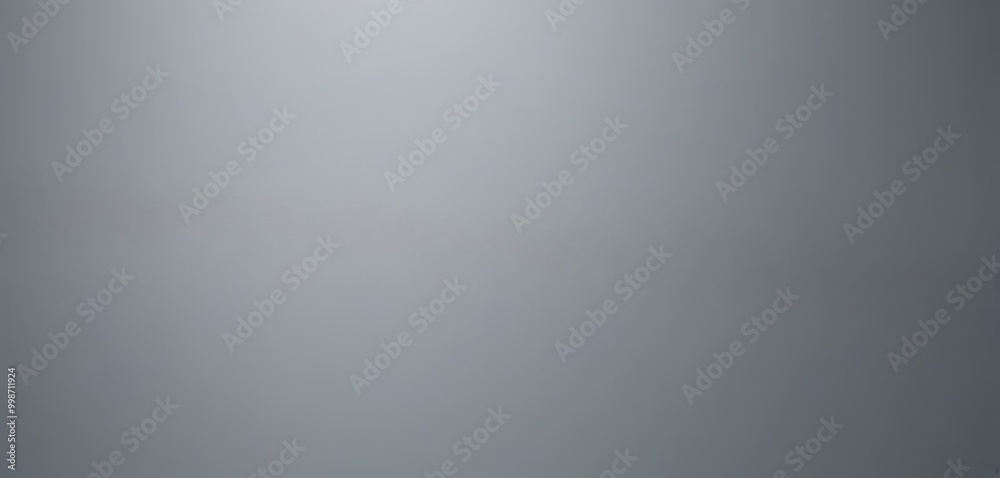 Aufkleber a gradient background transitioning from a darker shade of gray to a lighter one, creating a smooth and uniform appearance