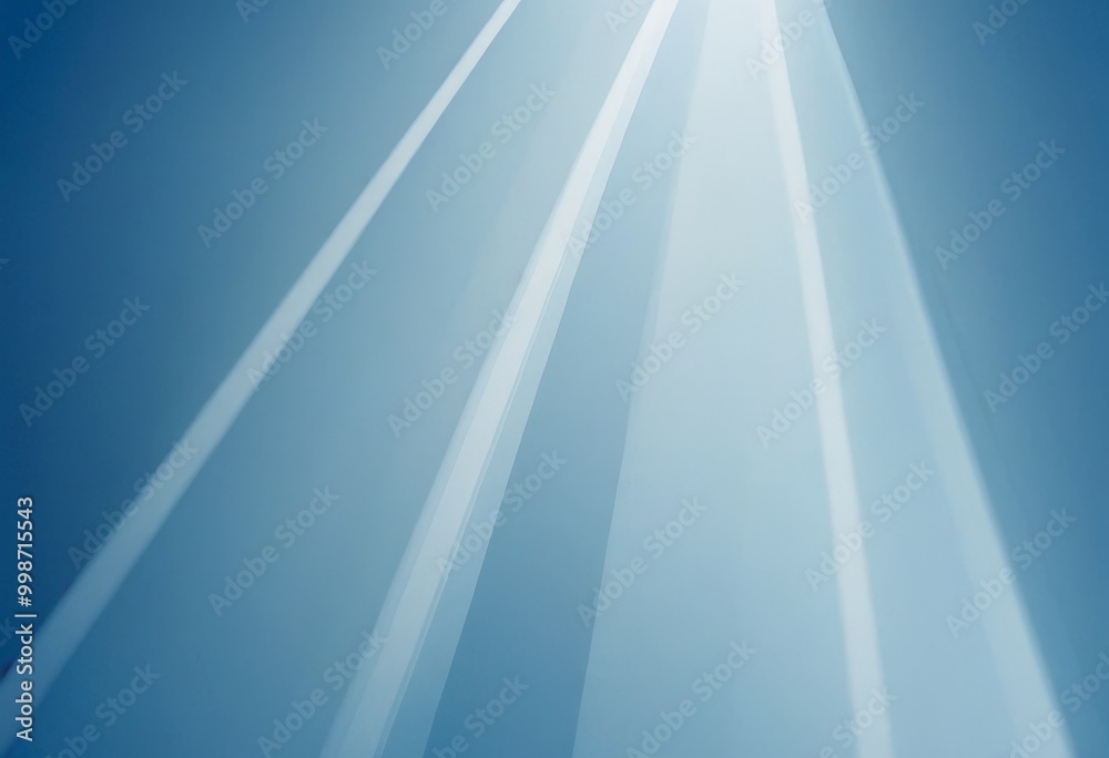 Aufkleber a blue sky with rays of light shining down from the top left corner, creating a sense of depth and perspective