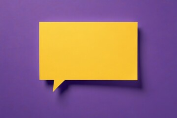 a close up of a yellow speech bubble on a purple background