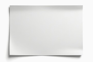 a close up of a piece of paper on a white surface
