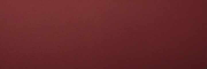 Fototapeta premium a dark red background with a subtle gradient effect, creating a rich and textured appearance
