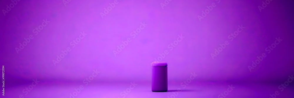Poster a purple cylindrical object stands alone against a solid purple background, creating a minimalist an