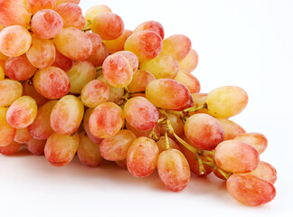 Juicy beautiful bunch of grapes on white background.