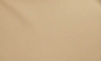 A simple, flat beige background with no discernible objects or text